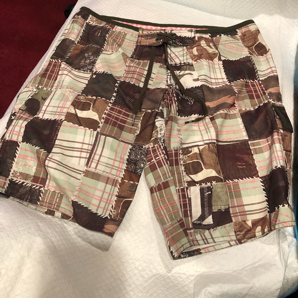Billabong Board shorts.Brown & green patchwork pattern.Hardly worn Size Junior 7